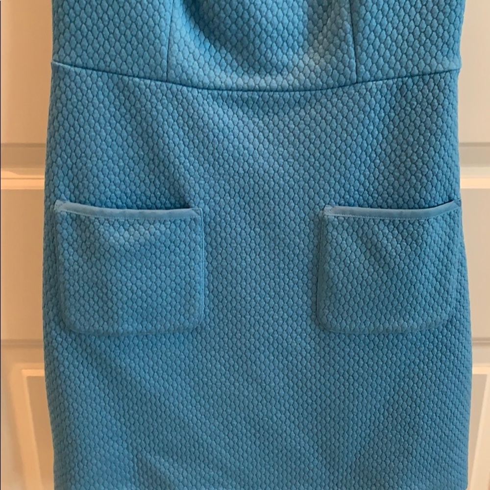Knit blue jumper with pockets